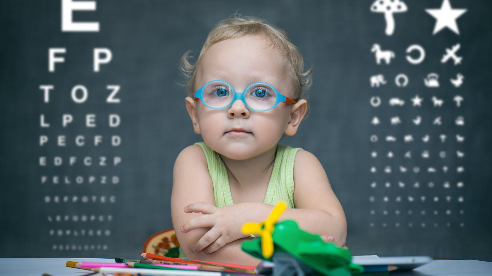 Kid in blue eyeglasses