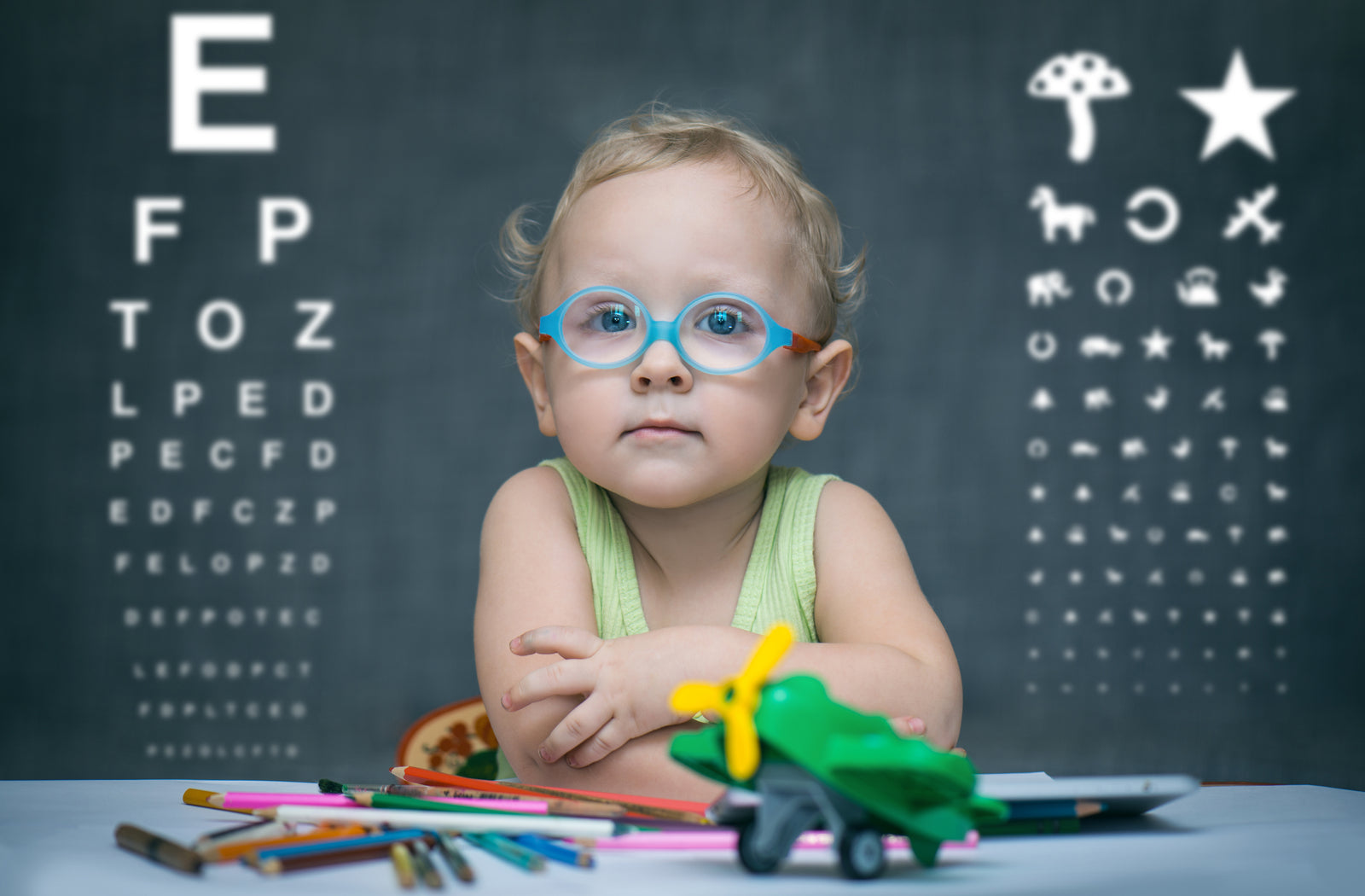 Kid in blue eyeglasses