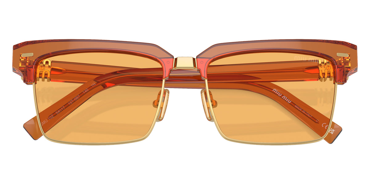 Miu Miu® MU 10ZS Sunglasses MU 10ZS 15T0B7 54 - Caramel Transparent