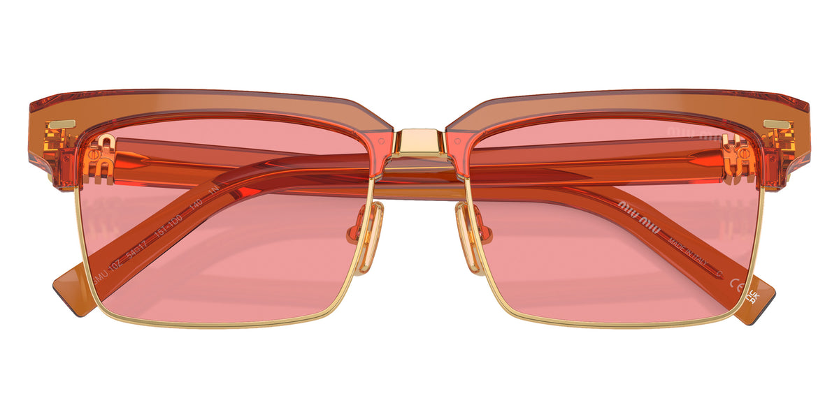 Miu Miu® MU 10ZS Sunglasses MU 10ZS 15T1D0 54 - Caramel Transparent